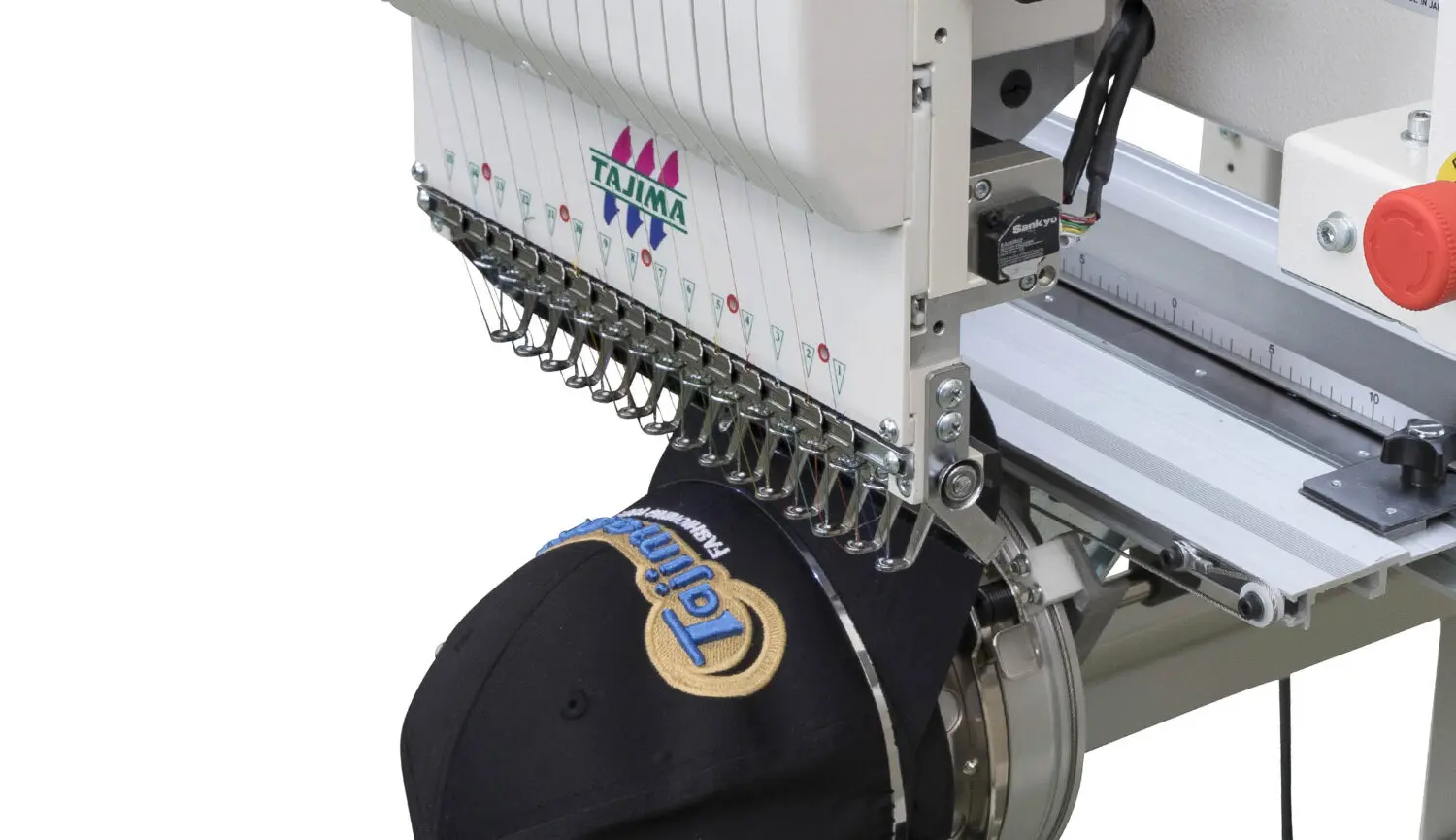 67c0a71fa2ae5_TMBR_Cap-fame_middle_FR-1500x865 A machine that is working on some kind of hat.